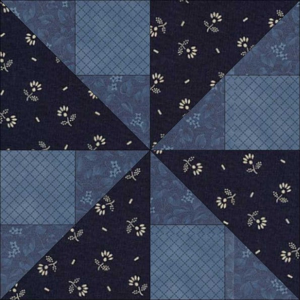 Spinner quilt block pattern — a step-by-step quilting tutorial using four contrasting triangles arranged into a spinning pinwheel design